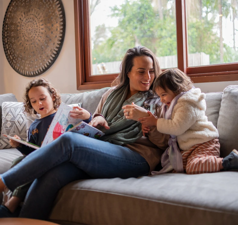 Family spending time together at home, representing saving for everyday moments and future financial goals with a Classic Five savings account.